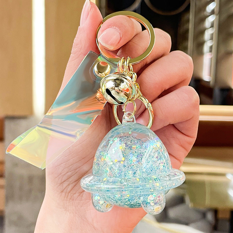 Wholesale Acrylic Fueled Spaceship Astronaut Luminous Quicksand Bottle Keychain